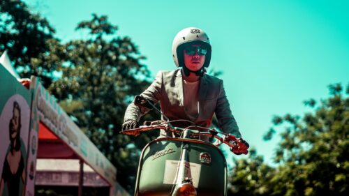 Stylish Man Riding Vintage Vespa Scooter Retro Style PC Wallpaper