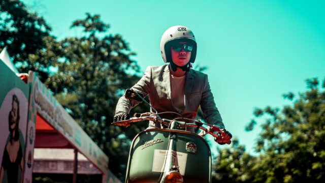 Stylish Man Riding Vintage Vespa Scooter Retro Style PC Wallpaper