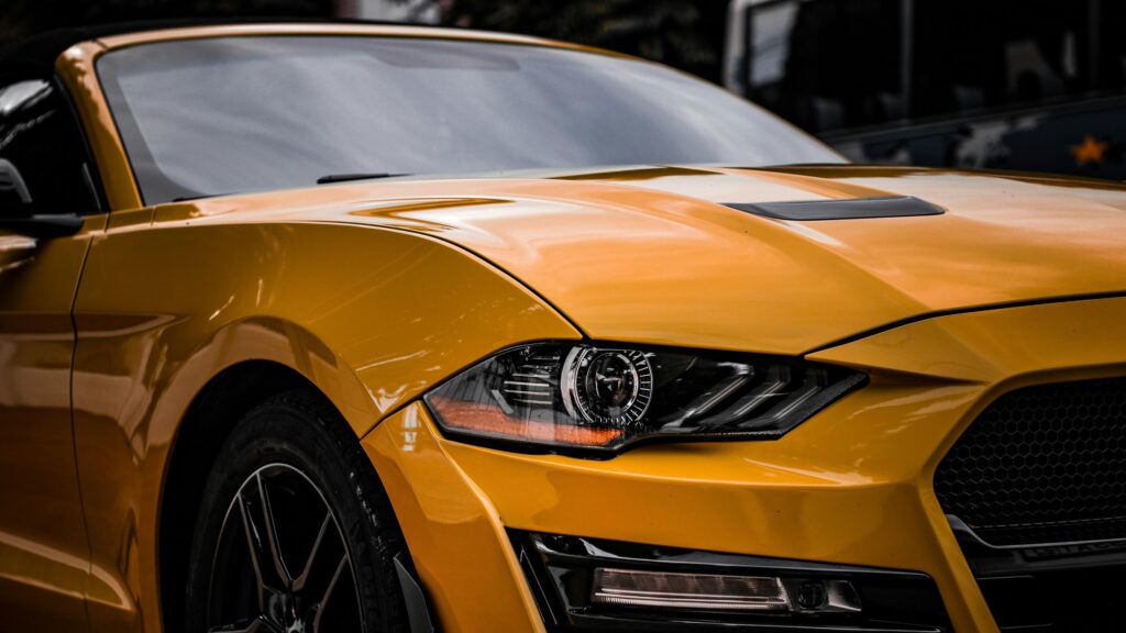 Stunning Yellow Ford Mustang Sports Car Front View 4K Wallpaper