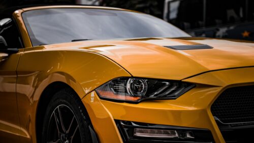 Stunning Yellow Ford Mustang Sports Car Front View 4K Wallpaper