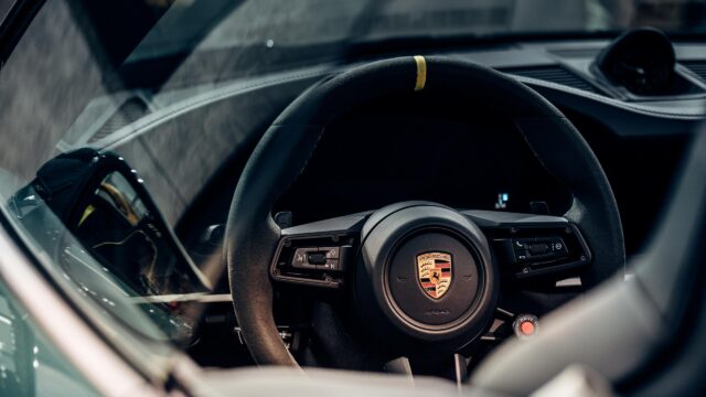 Close Up Porsche Steering Wheel Interior Luxury Sportscar 4K Wallpaper
