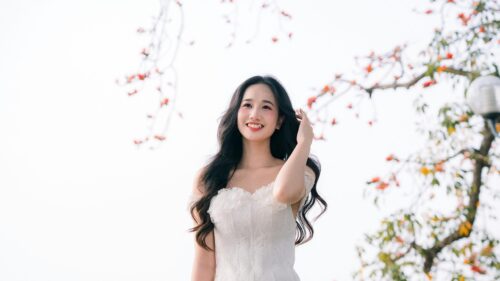 Beautiful Asian Woman in White Dress with Blooming Flowers Desktop Wallpaper