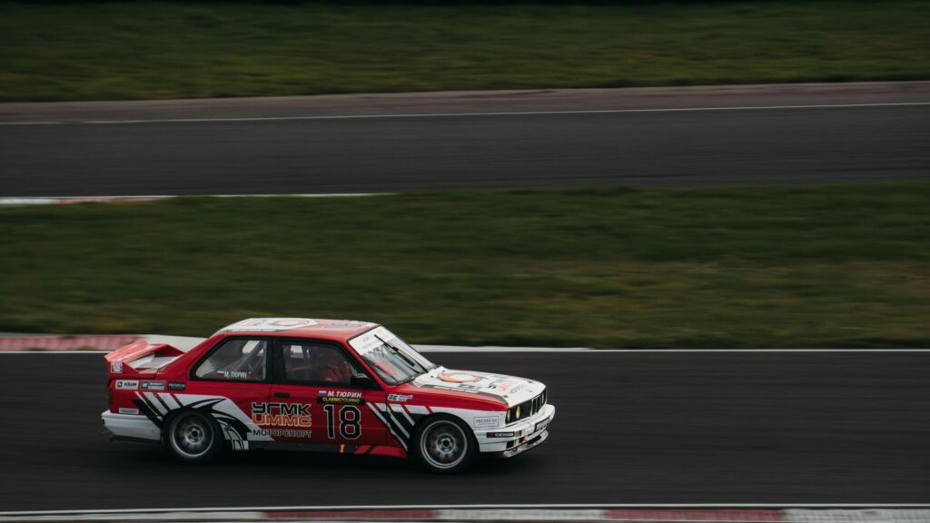 BMW E30 M3 Touring Car Racing on Track 4K Wallpaper