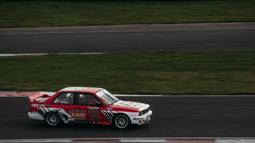 BMW E30 M3 Touring Car Racing on Track 4K Wallpaper