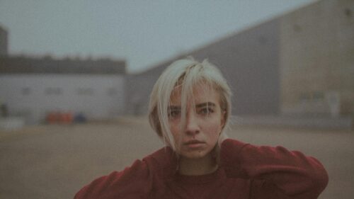 Sad Blonde Girl in Red Sweater Moody Portrait 4K Desktop Wallpaper