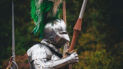 Medieval Knight in Shining Armor with Plumes 4K Desktop Wallpaper