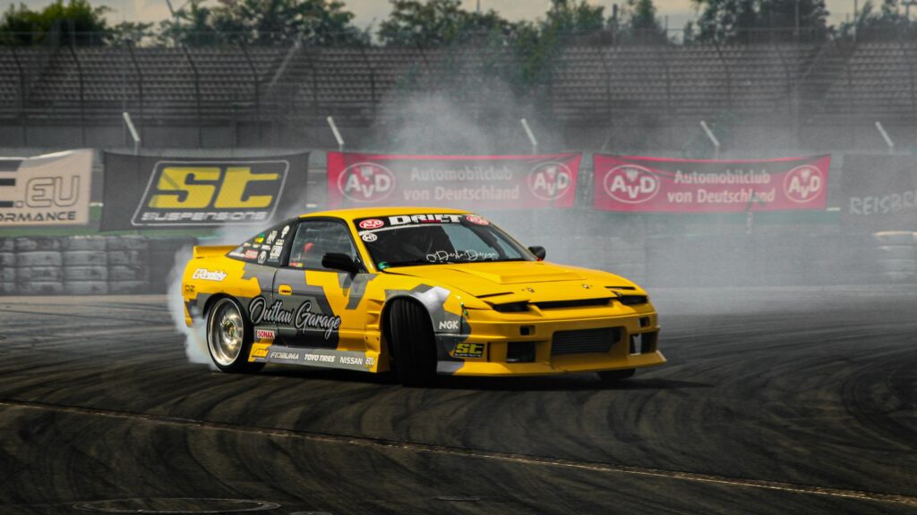 Drifting Yellow Nissan 180SX Outlaw Garage Action 4K Wallpaper