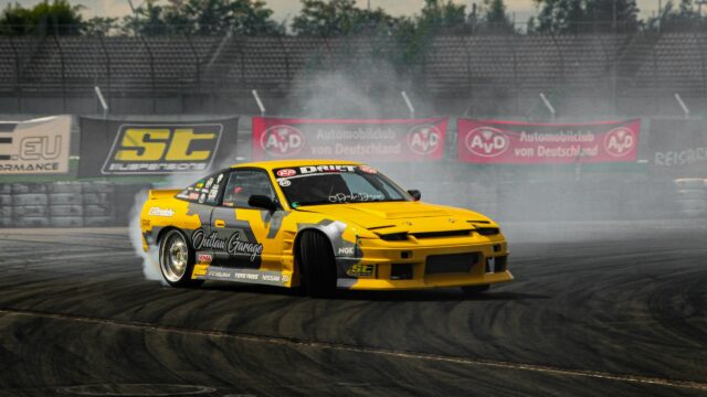Drifting Yellow Nissan 180SX Outlaw Garage Action 4K Wallpaper