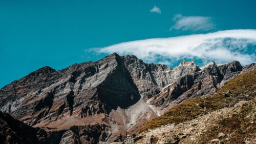 Majestic Rocky Mountain Peak with Lenticular Cloud 4K Desktop Wallpaper