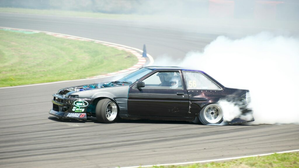 Modified Drift Car Racing on Track 4K Wallpaper