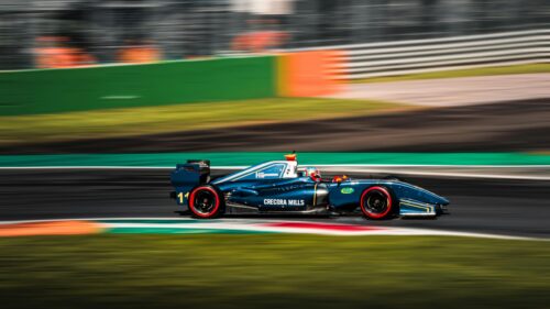 Blue Formula Race Car on Track High Speed 4K Wallpaper