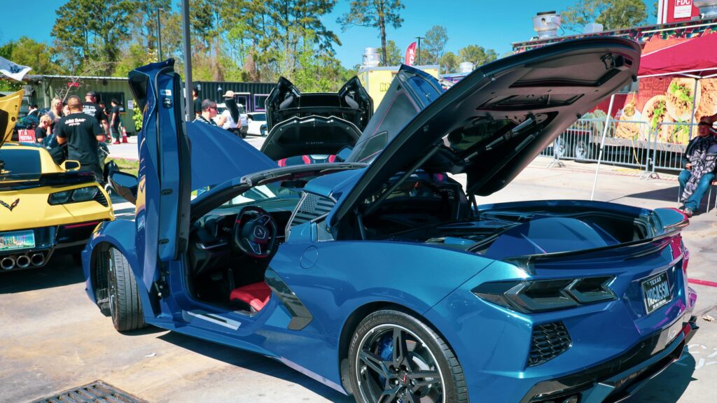 Blue C8 Chevrolet Corvette Stingray with Doors Open 4K Desktop Wallpaper