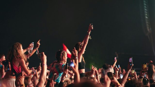 Concert Crowd With Phones Raised High 4K Desktop Wallpaper