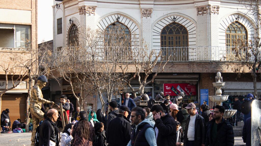 Bustling Urban Plaza Street Life and Architecture PC Wallpaper