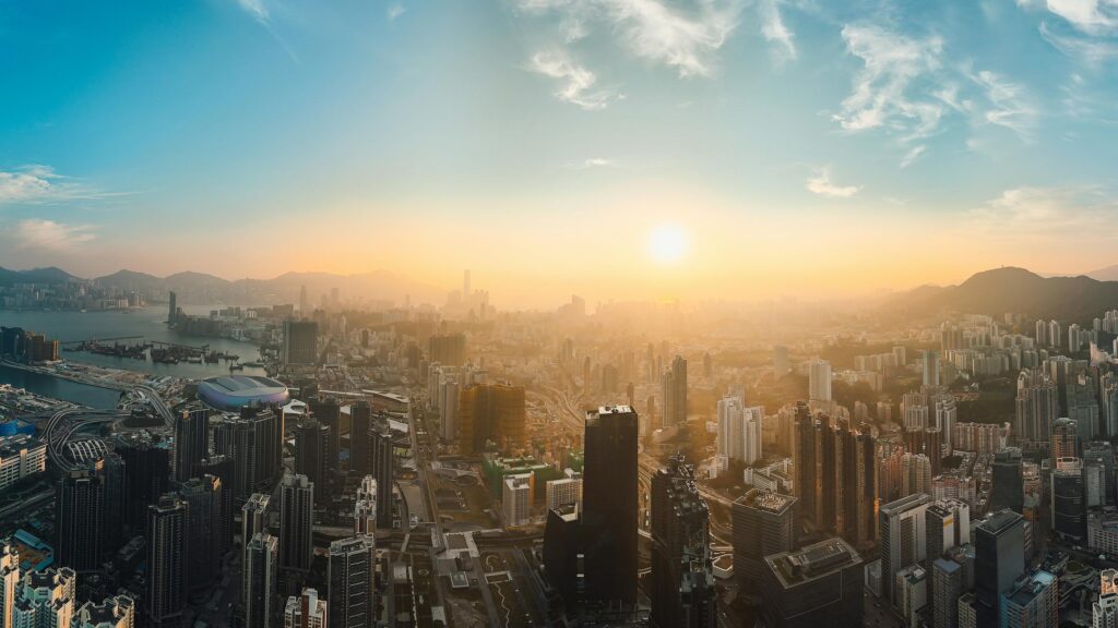 Breathtaking Sunset Over Hong Kong Skyline 4K Desktop Wallpaper