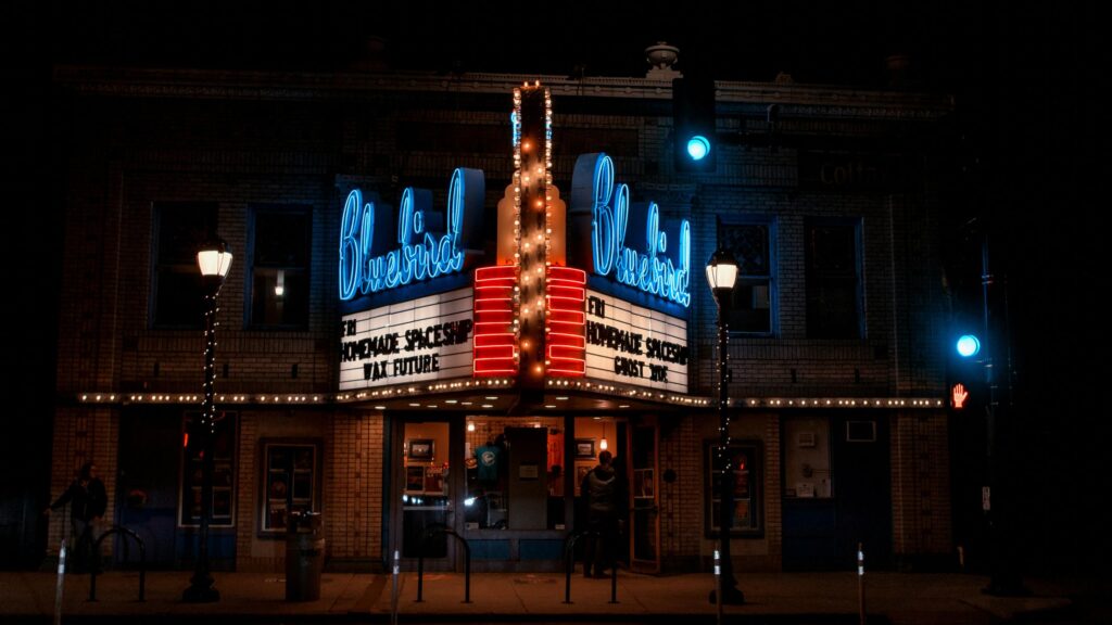 Neon Bluebird Theater Night Scene High Resolution PC Wallpaper