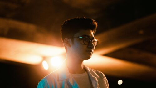 Cinematic Portrait of Young Man in Glasses 4K Desktop Wallpaper