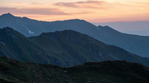 Serene Mountain Ridge at Golden Hour Sunset Desktop Wallpaper