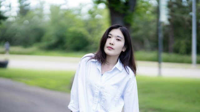 Beautiful Young Asian Woman in White Shirt Outdoor Portrait 4K Wallpaper