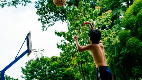Shirtless Young Basketball Player Shooting Hoop 4K Desktop Wallpaper
