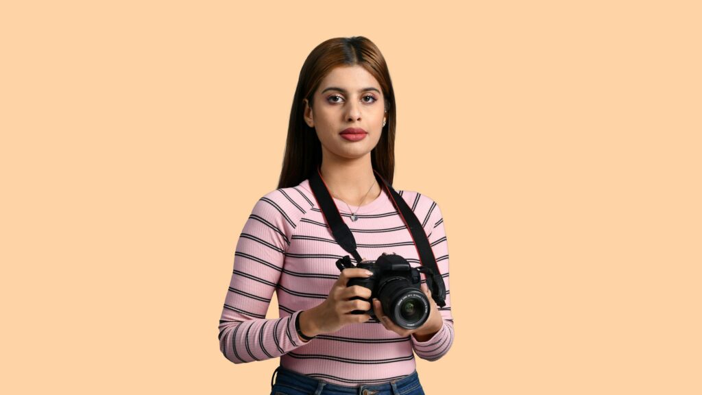 Portrait of a Young Female Photographer in Striped Top Desktop Wallpaper