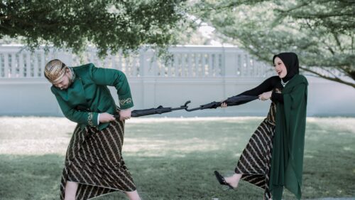 Javanese Couple Playing with Umbrellas Wedding Photoshoot 4K Wallpaper