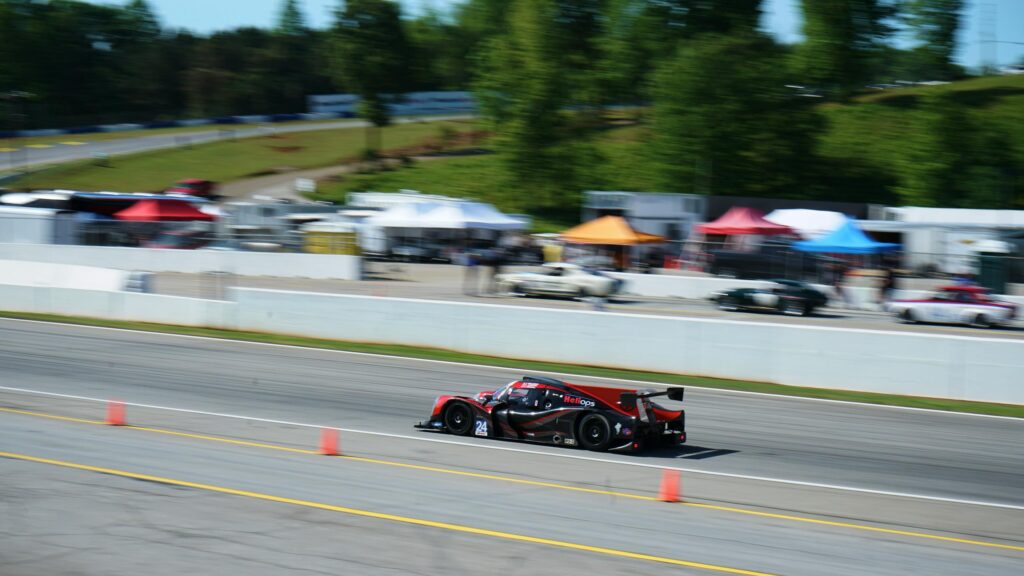 Le Mans Prototype Race Car Speeding on Track Desktop Wallpaper