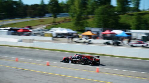 Le Mans Prototype Race Car Speeding on Track Desktop Wallpaper