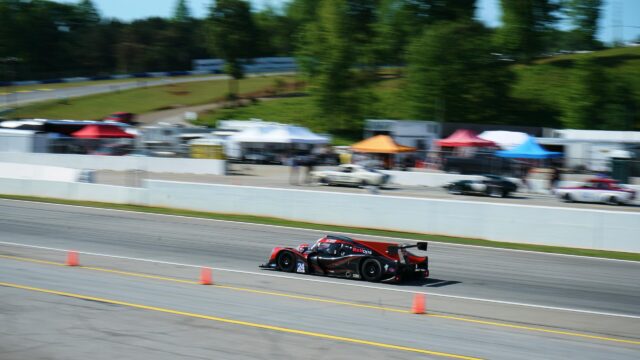 Le Mans Prototype Race Car Speeding on Track Desktop Wallpaper