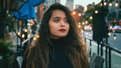 Stunning Portrait of a Woman with Dark Lipstick Evening City Lights 4K Wallpaper