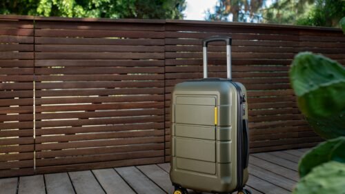 Olive Green Modern Hardshell Suitcase Travel Luggage 4K Wallpaper