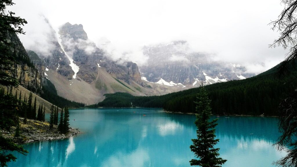 Breathtaking Moraine Lake Turquoise Waters and Mountain Peaks 4K Wallpaper