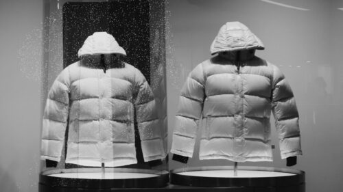 Minimalist White Puffer Jackets in Display Store Window Desktop Wallpaper