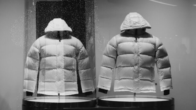 Minimalist White Puffer Jackets in Display Store Window Desktop Wallpaper