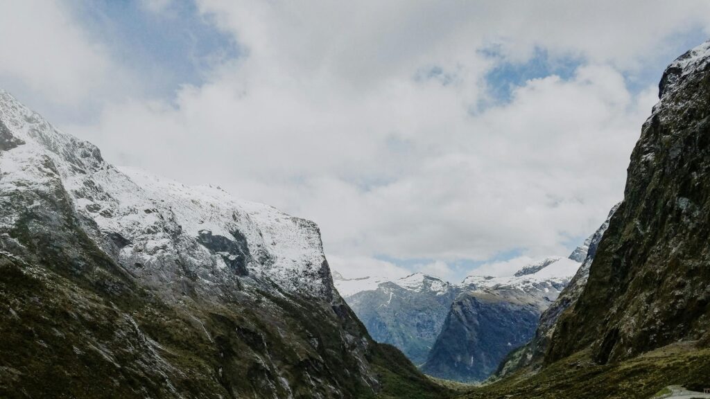 Majestic Snowy Peaks in Milford Sound New Zealand Desktop Wallpaper