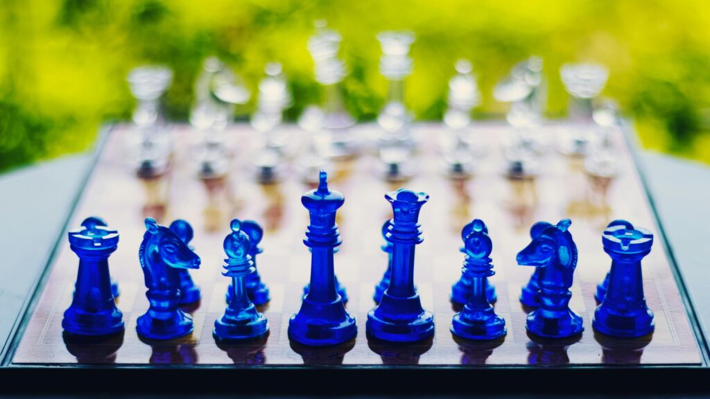 Stunning Blue Glass Chess Set Macro 4K Desktop Wallpaper
