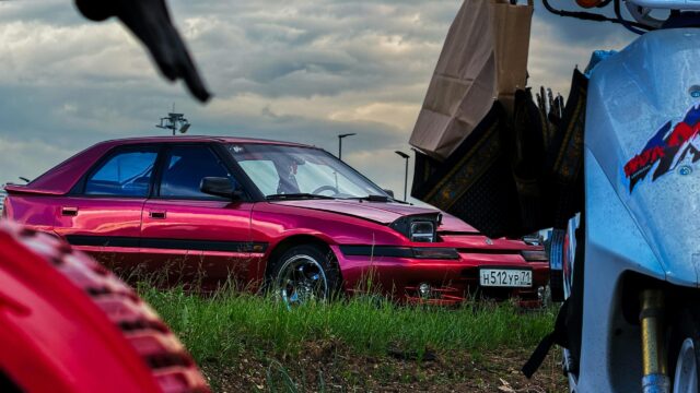 Custom Red Mazda 323F Pop-Up Headlight Sedan 4K Desktop Wallpaper