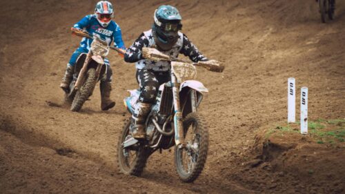 Intense Motocross Racing Action with Dirt Bikes 4K Wallpaper