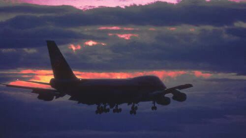 Stunning Silhouette of a Jumbo Jet at Sunset 4K Desktop Wallpaper