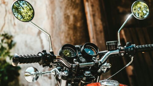 Vintage Motorcycle Handlebars and Gauges Close Up 4K Wallpaper