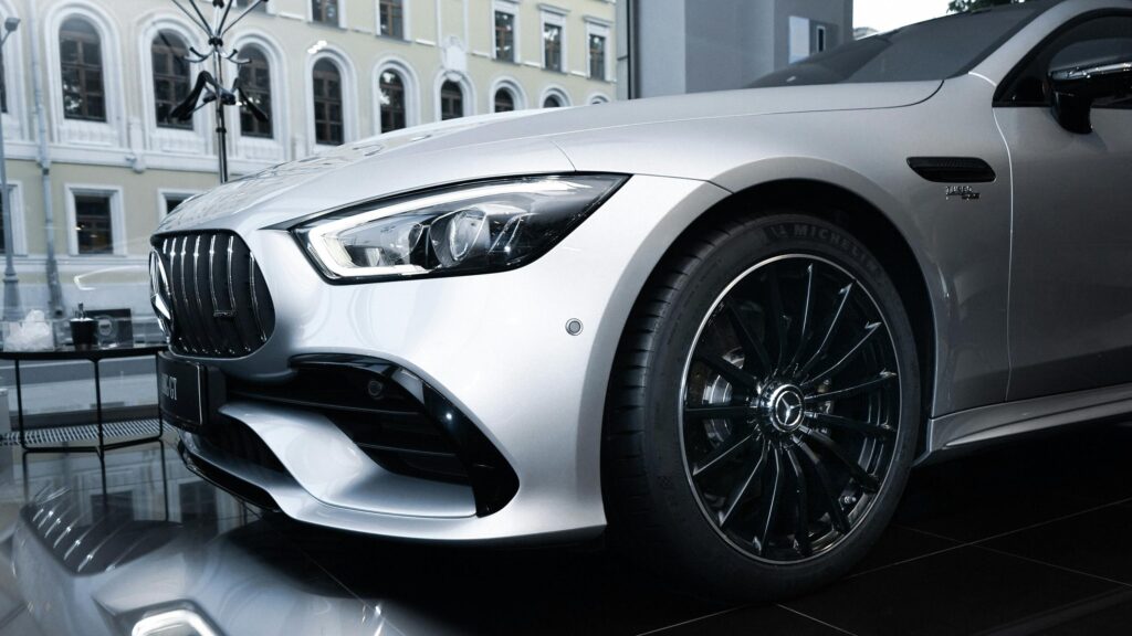 Silver Mercedes-AMG GT Sports Car in Showroom Desktop Wallpaper