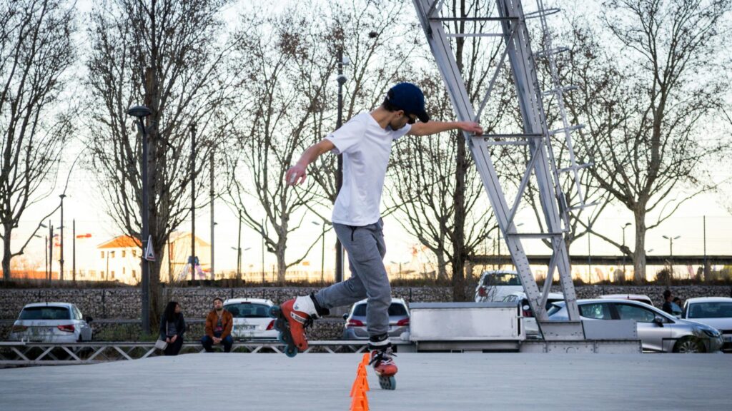 Professional Rollerblader Slalom Practice in the Park 4K Wallpaper