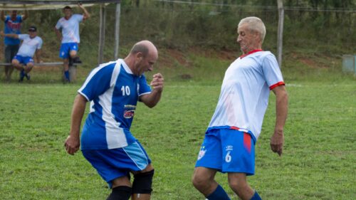 Senior Amateur Soccer Match Intense Duel Action 4K Wallpaper