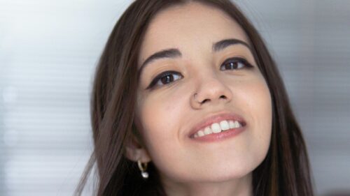 Close Up Portrait of a Beautiful Smiling Woman with Nose Ring 4K Wallpaper