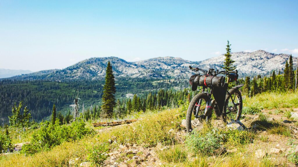 Mountain Bike Adventure in the Wilderness 4K Desktop Wallpaper