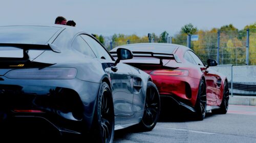 Two Mercedes-AMG GT R Sports Cars on Racetrack 4K Wallpaper
