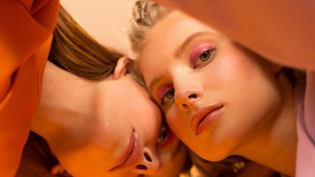 Two Women with Pink Makeup Close Up Aesthetic 4K Desktop Wallpaper