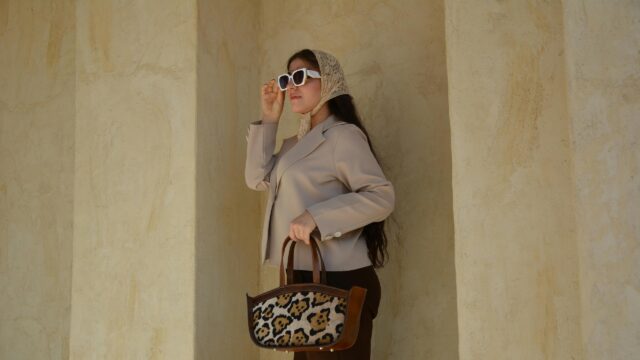 Stylish Woman in Beige Blazer and Headscarf 4K Desktop Wallpaper