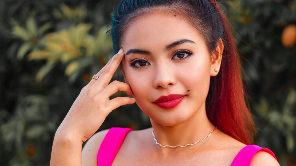 Stunning Portrait of a Beautiful Young Woman with Red Lips 4K Wallpaper