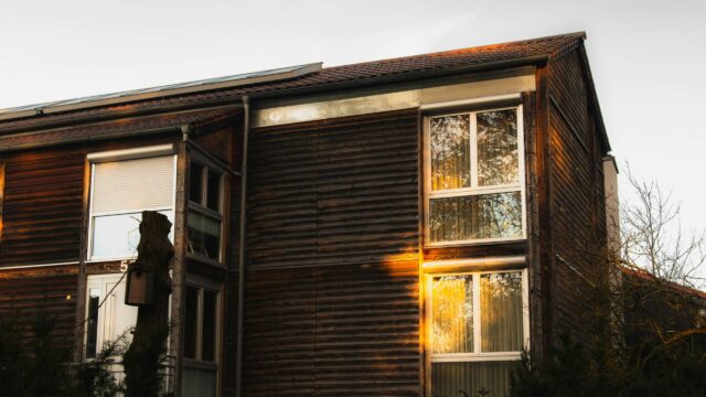 Rustic Wooden House at Golden Hour Scenic Architectural 4K Wallpaper